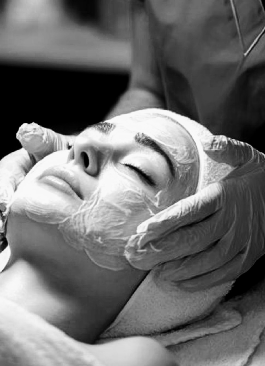 Beauty therapist with a client